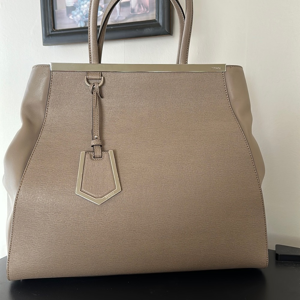 Fendi bag bigger Excellent condition. Few scratches one side . Dust bag